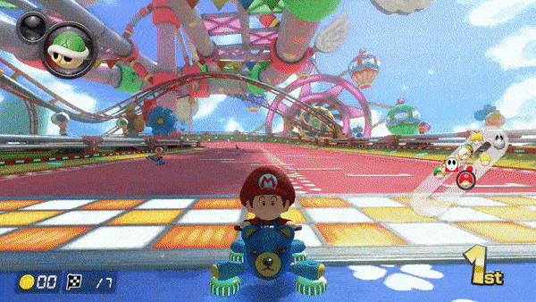 A screencapture from Mario Kart is seen, with a faded triangle play button in the center. When hovered, a gif plays that shows Baby Mario driving around the Baby Park course. From the corners of the screen, photos of Karl Marx, Friedrich Engels, Max Weber, and Émile Durkheim emerge.